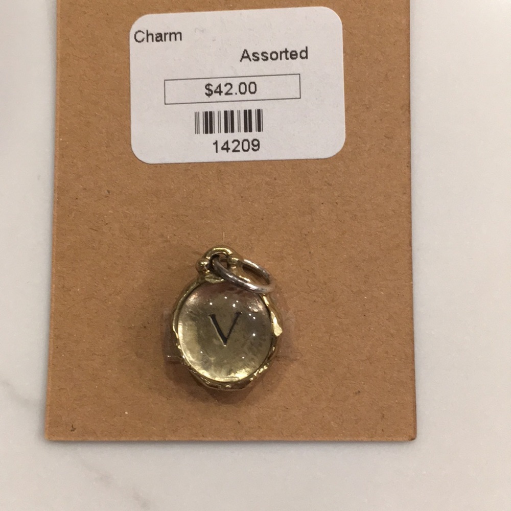 Intra insignia charm by waxing poetic “V”